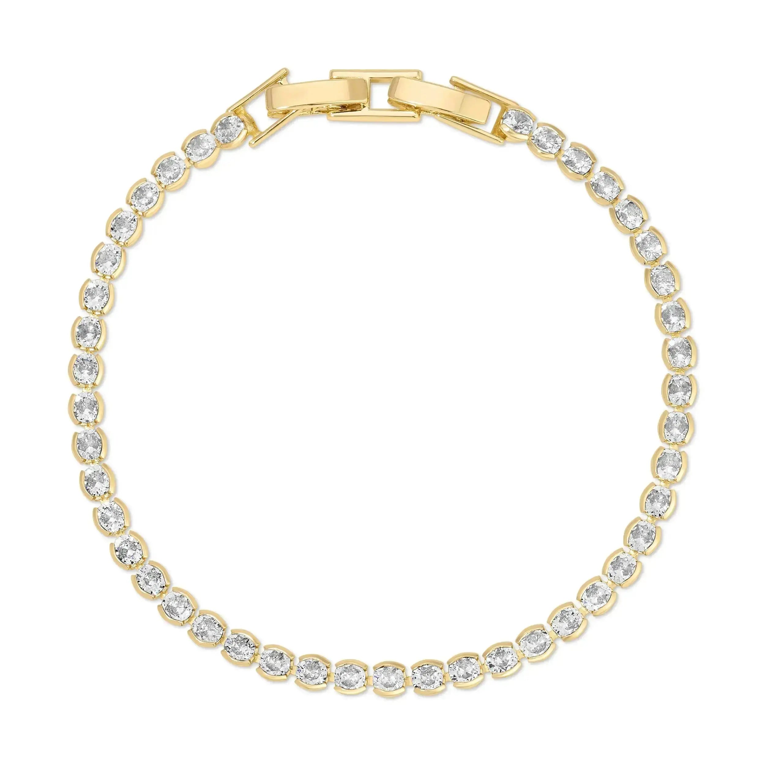 A tennis bracelet with gold plating and brilliant-cut cubic zirconia stones.