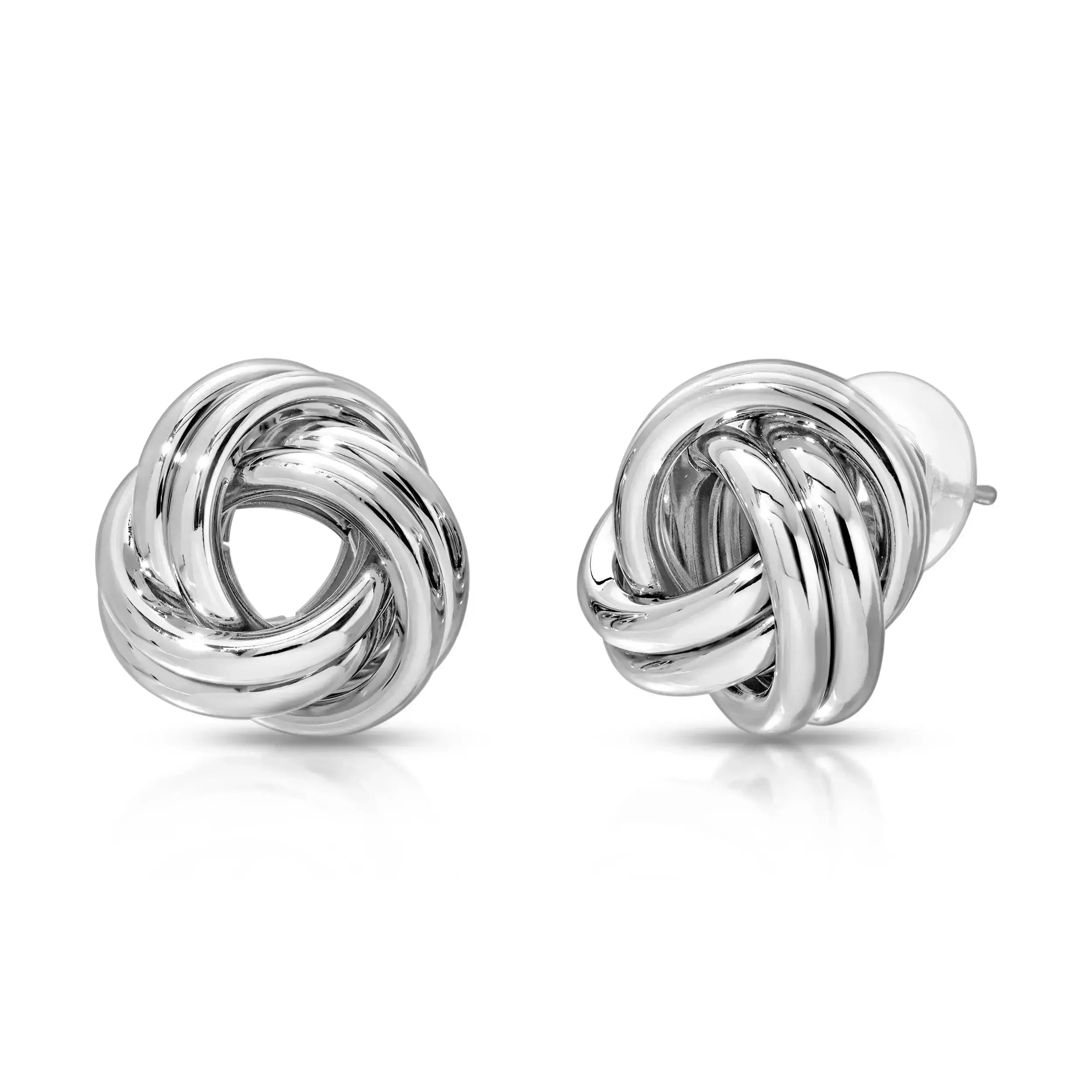 A pair of silver-colored knot earrings with a twisted silhouette, displayed against a white background.